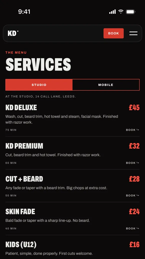 KD Barbers's Barbr website on a phone