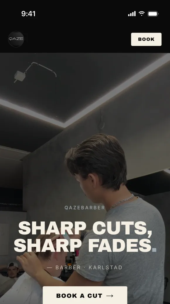 Qazebarber's Barbr website on a phone